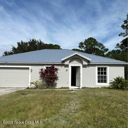 1815 Firethorn Rd NW in Palm Bay, FL - Building Photo