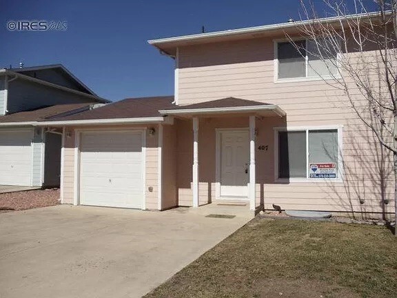 407 Monico Gardens Dr in Evans, CO - Building Photo