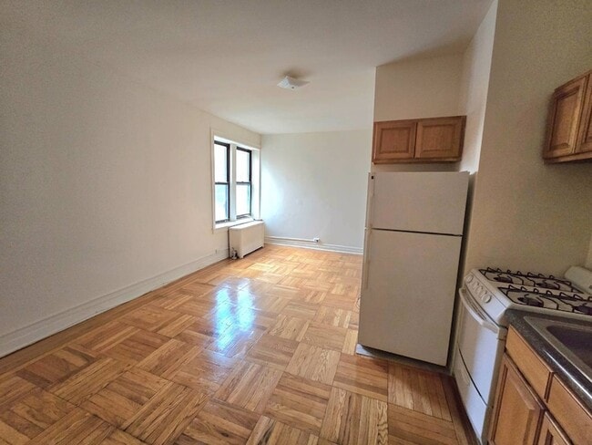 property at 59-16 Woodside Ave