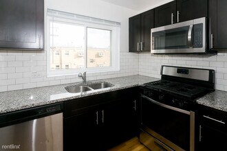 7549 N Bell Ave-Unit -Unit 2C in Chicago, IL - Building Photo - Building Photo