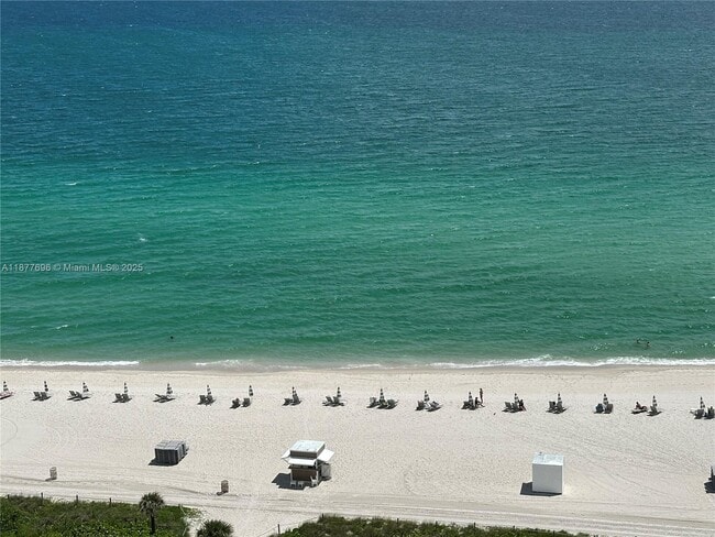 property at 6039 Collins Ave