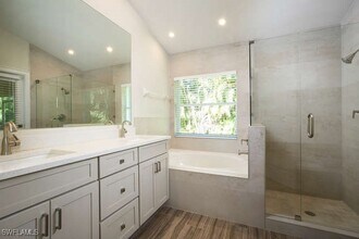 22199 Seashore Cir in Estero, FL - Building Photo - Building Photo