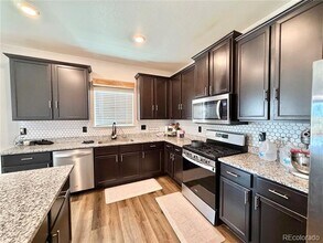 8940 Uravan St in Commerce City, CO - Building Photo - Building Photo