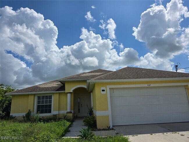 409 Hull Ave S in Lehigh Acres, FL - Building Photo - Building Photo