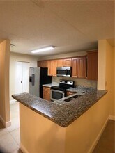11229 W Atlantic Blvd, Unit #102 in Coral Springs, FL - Foto de edificio - Building Photo