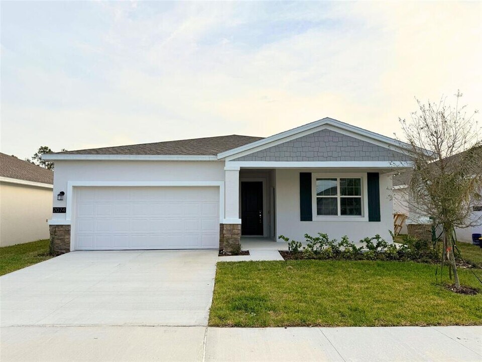 2074 Freemark St-Unit -B in Osteen, FL - Building Photo