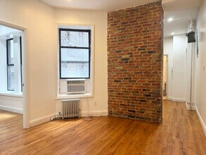 215 E 4th St in New York, NY - Building Photo - Building Photo