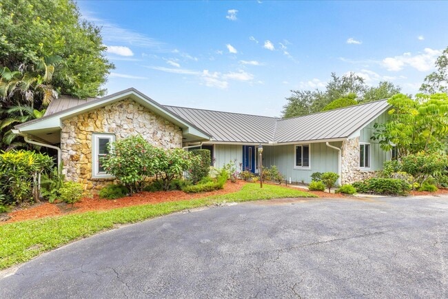 property at 1614 SW St Andrews Dr