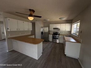 1256 Dawn St NE in Palm Bay, FL - Building Photo - Building Photo