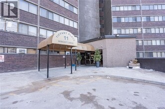 11 Wincott Dr in Toronto, ON - Building Photo - Building Photo