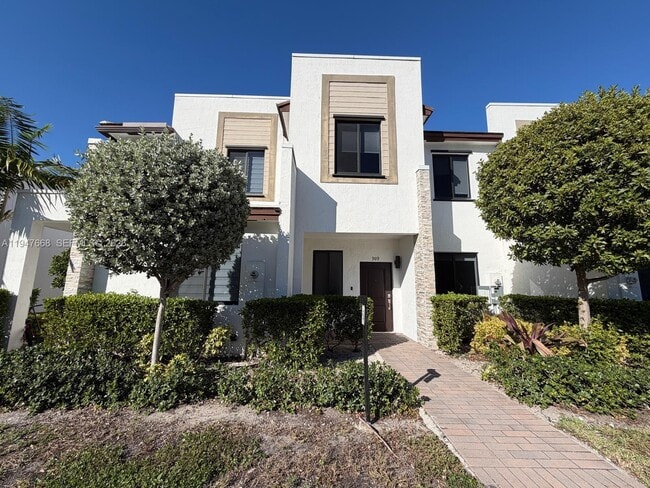 property at 909 NE 211th St