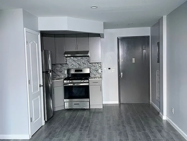 property at 7302 Woodside Ave