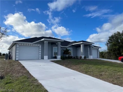 320-322 Ivan Ave S in Lehigh Acres, FL - Building Photo