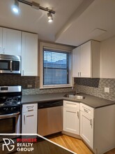 2317 N Rockwell St, Unit 2323-GDNC in Chicago, IL - Foto de edificio - Building Photo