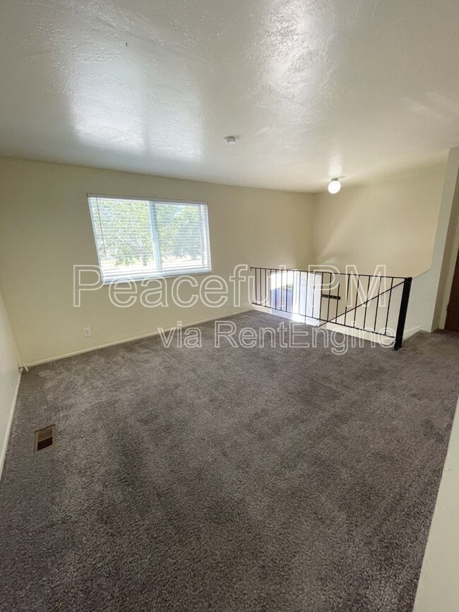 4693 S Arlington Park Dr in West Valley City, UT - Building Photo - Building Photo