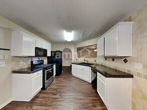 3860 Charlton Ives Dr NW in Lilburn, GA - Building Photo - Building Photo