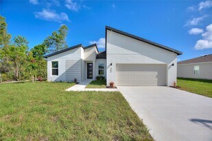 205 Hyacinth Ct in Poinciana, FL - Building Photo