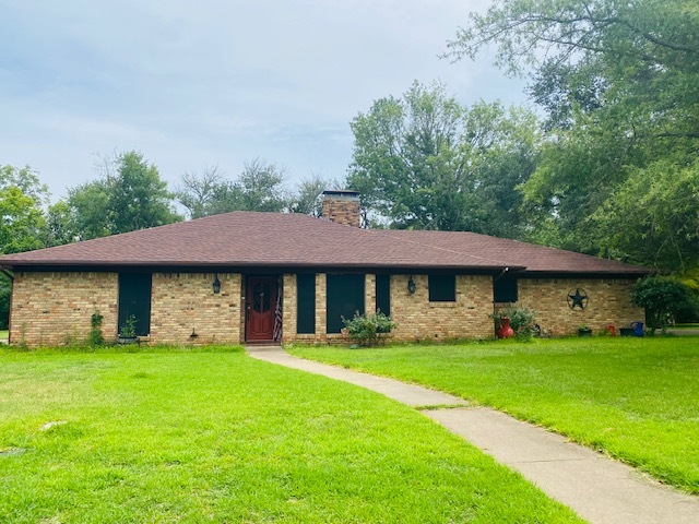 1107 Brookhollow Dr in Jacksonville, TX - Building Photo