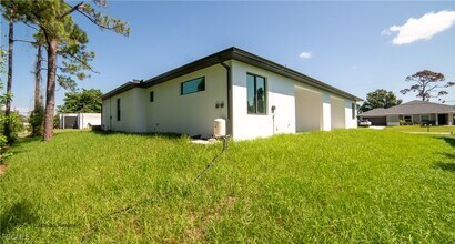 2401-2403 Matena Ave S in Lehigh Acres, FL - Building Photo - Building Photo