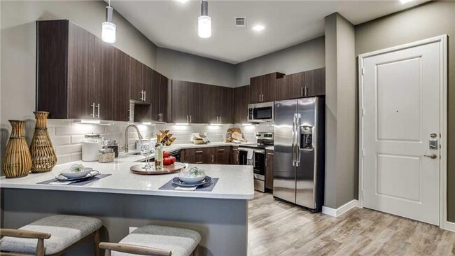1050 Galatyn Pkwy-Unit -65780 in Richardson, TX - Building Photo - Building Photo