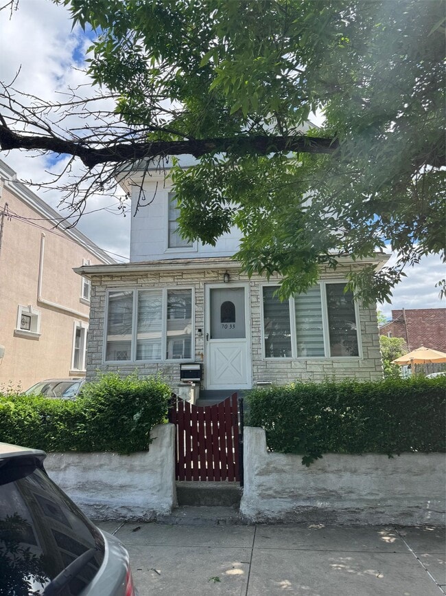 property at 70-33 72nd Pl