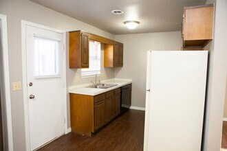 1427 W Rolling Oaks Dr in Rogers, AR - Building Photo - Building Photo