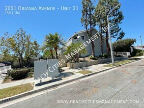 2051 N Orizaba Ave, Unit Unit 21 in Signal Hill, CA - Building Photo - Building Photo