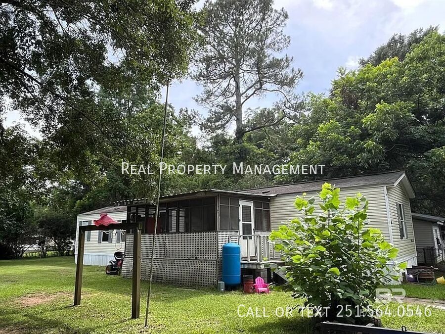 7719 Bermuda Dr in Semmes, AL - Foto de edificio