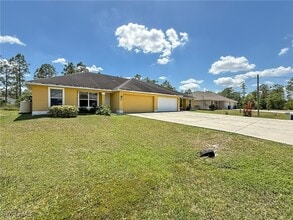 349 Justice Ave in Lehigh Acres, FL - Building Photo - Building Photo