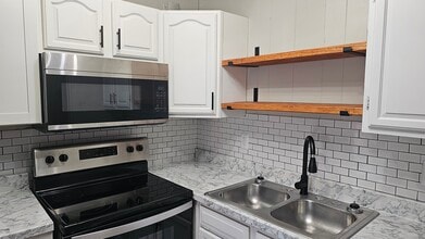Southern Charm & Modern Luxury Await: Discover 33 Sunrise Lane in Ringgold, GA - Building Photo - Building Photo