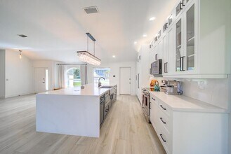 1853 Shower Tree Way in Wellington, FL - Building Photo - Building Photo