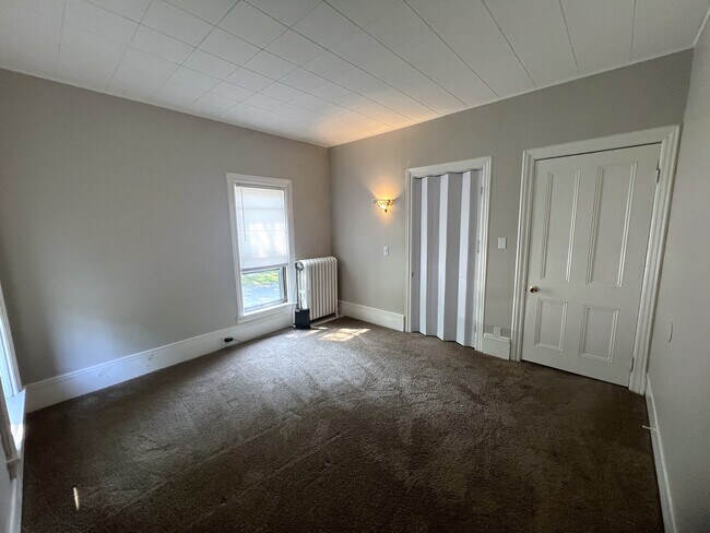 52 E 3rd St, Unit 301 in Corning, NY - Foto de edificio - Building Photo