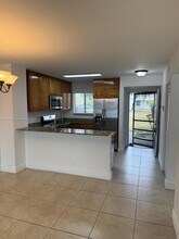 8710 N Sherman Cir in Miramar, FL - Building Photo - Building Photo