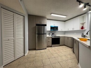 4025 W McNab Rd, Unit 212E in Pompano Beach, FL - Building Photo - Building Photo
