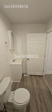 2136 N Fulton Ave, Unit Apt-1 in Baltimore, MD - Building Photo - Building Photo