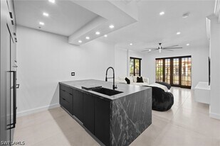 23191 Fashion Dr in Estero, FL - Building Photo