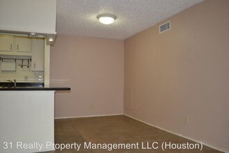 10047 Westpark Dr in Houston, TX - Building Photo - Building Photo