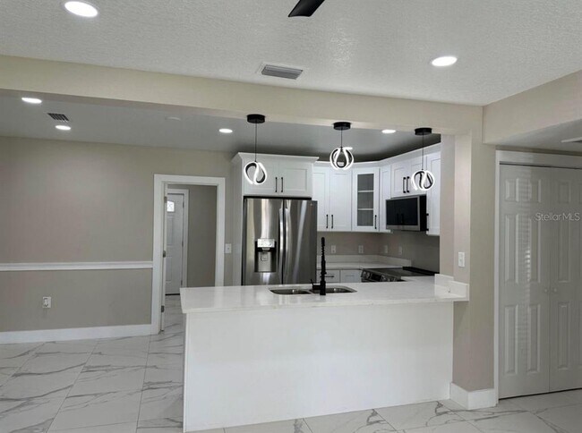 5008 N Tampania Ave in Tampa, FL - Building Photo - Building Photo