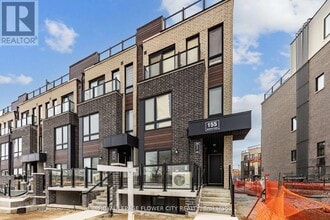 155 Tapscott Rd in Toronto, ON - Building Photo - Building Photo