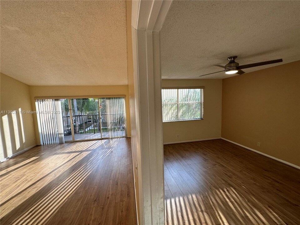 8801 Wiles Rd, Unit 303 in Coral Springs, FL - Building Photo