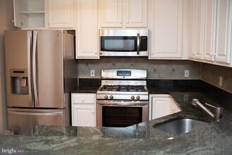 1304 Roundhouse Ln-Unit -309 in Alexandria, VA - Building Photo - Building Photo