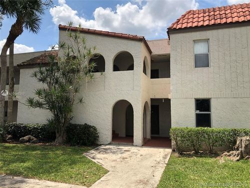 7435 Woodmont Terrace-Unit -20E in Tamarac, FL - Building Photo