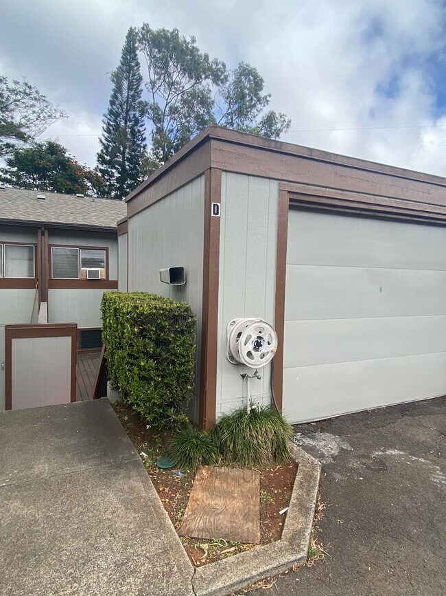 property at 98-1073 Komo Mai Dr