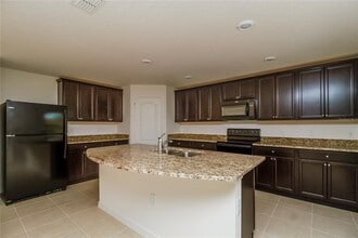 1980 Piedmont Ct in Mascotte, FL - Building Photo - Building Photo