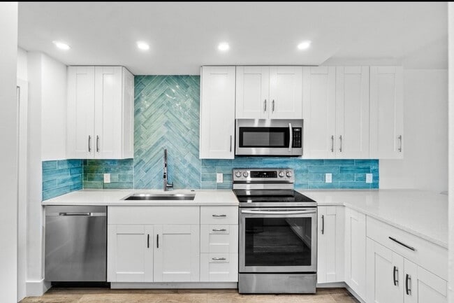 698 NE Spanish River Blvd, Unit 14