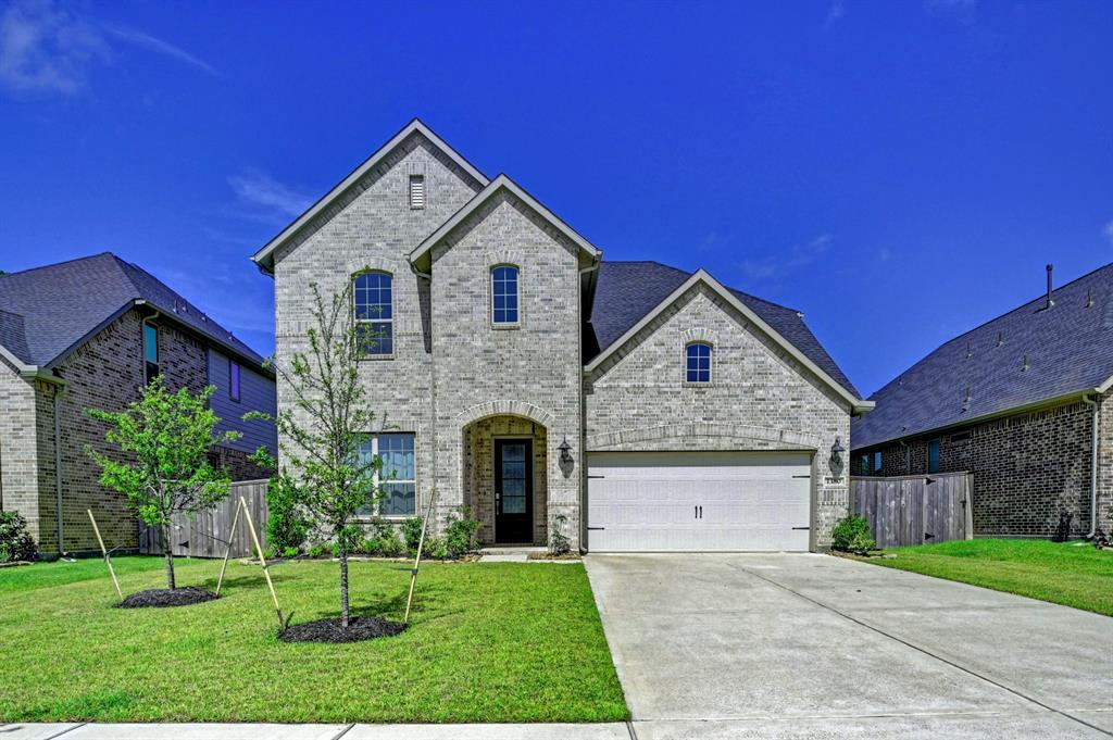 1380 Knollbridge Pt Ln in Pinehurst, TX - Building Photo