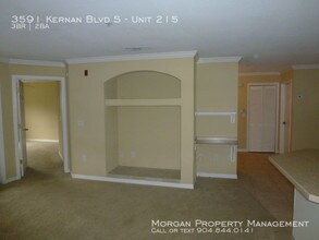 3591 Kernan Blvd S-Unit -Unit 215 in Jacksonville, FL - Building Photo - Building Photo