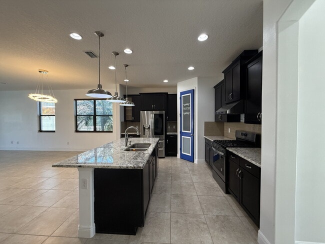 7782 Paragrass Ave in Melbourne, FL - Foto de edificio - Building Photo