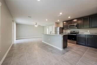 1662 Redfin Dr in Poinciana, FL - Building Photo - Building Photo