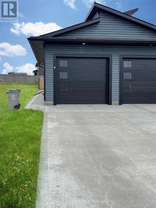 10406-10129 129 Ave in Grande Prairie, AB - Building Photo